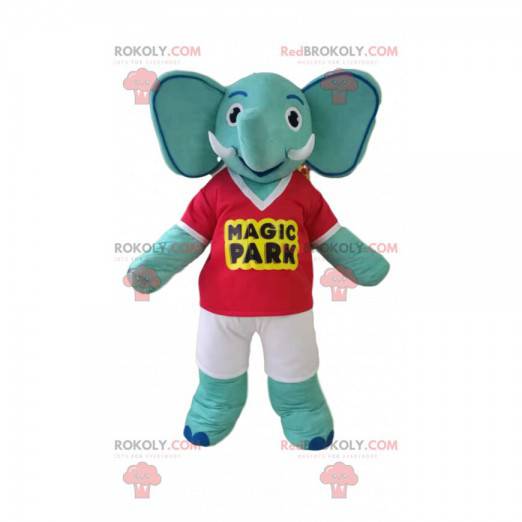 Mascote elefante azul com camiseta vermelha e shorts amarelos -