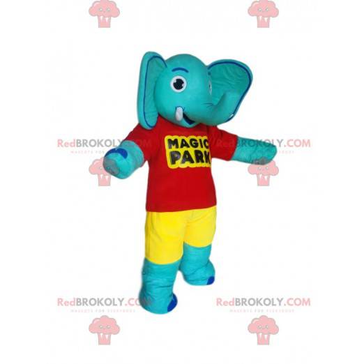 Mascote elefante azul com camiseta vermelha e shorts amarelos -