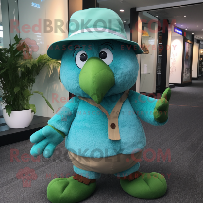 Cyan Kiwi mascot costume character dressed with a Romper and Hats