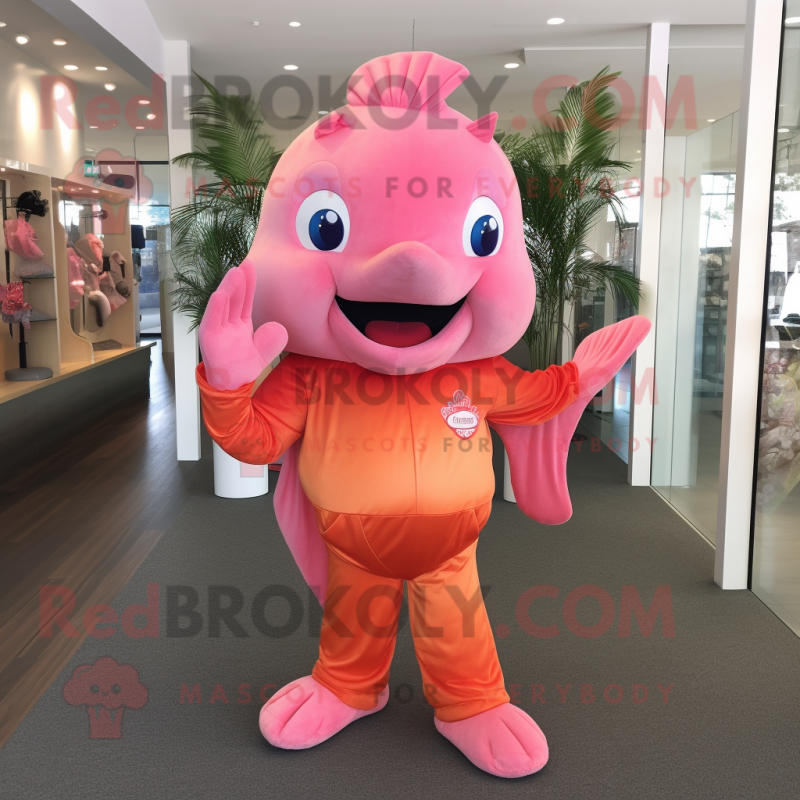 Pink Goldfish mascot costume character dressed with a Henley Tee and Foot pads