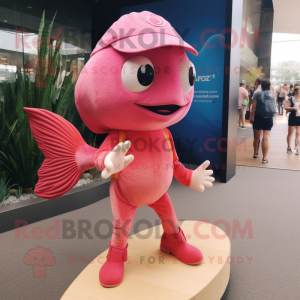 Pink Goldfish mascot costume character dressed with a Henley Tee and Foot pads