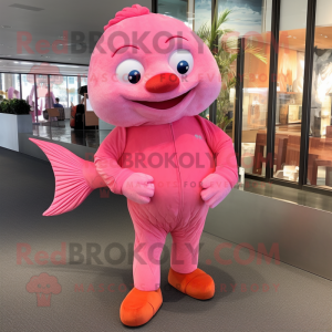 Pink Goldfish mascot costume character dressed with a Henley Tee and Foot pads