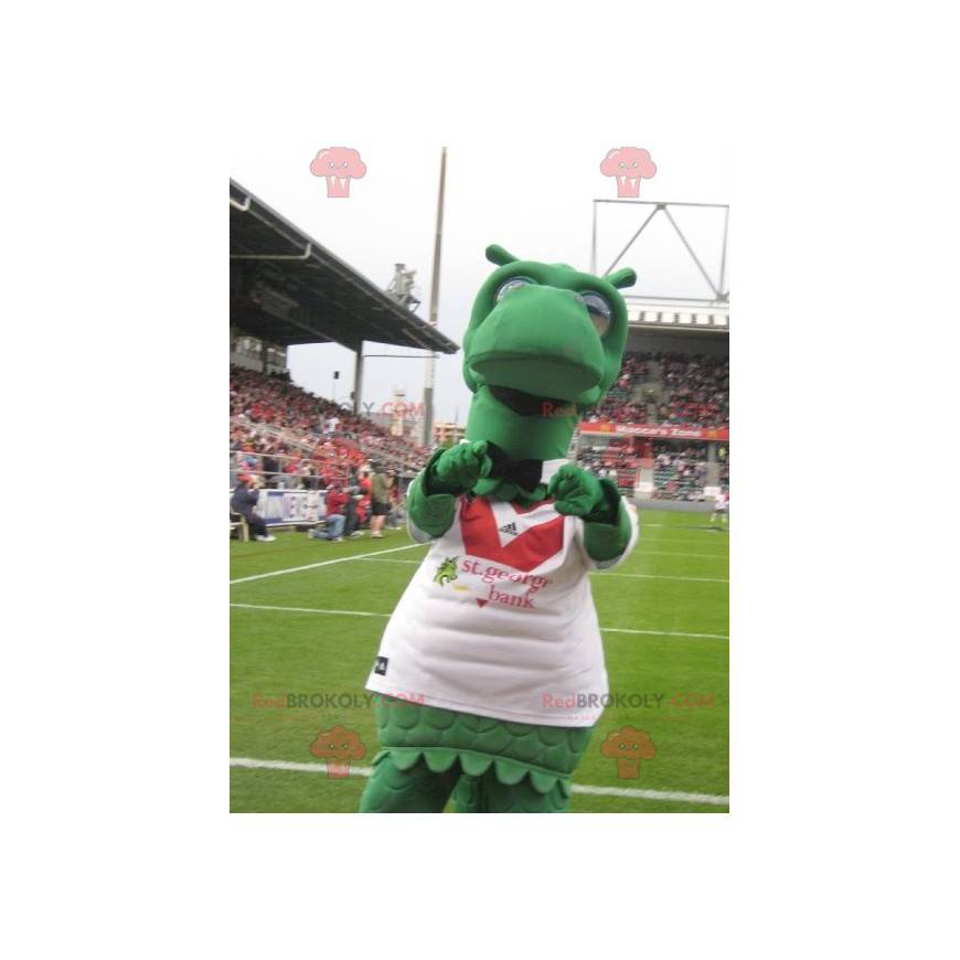 Mascotte di dinosauro drago verde con una maglia sportiva -