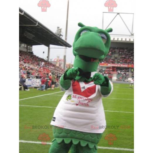 Mascote do dinossauro dragão verde com uma camisa esportiva -