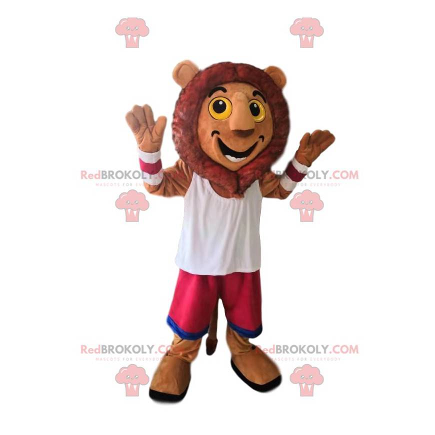 Mascotte leone molto felice con pantaloncini fucsia -