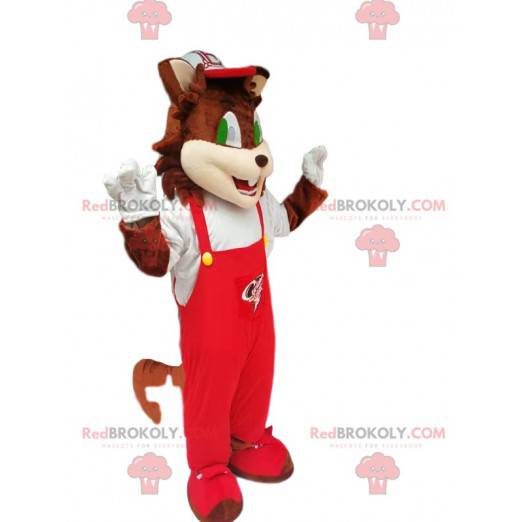 Mascotte de chat marron avec une salopette rouge -