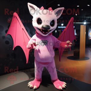Pink Bat mascot costume character dressed with a Graphic Tee and Cufflinks