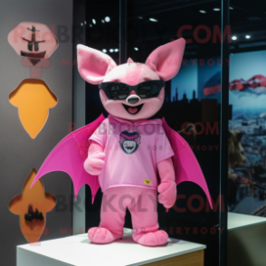 Pink Bat mascot costume character dressed with a Graphic Tee and Cufflinks