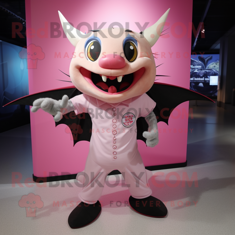 Pink Bat mascot costume character dressed with a Graphic Tee and Cufflinks