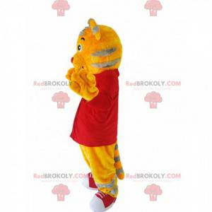 Mascotte de tigrou jaune avec un maillot rouge - Redbrokoly.com