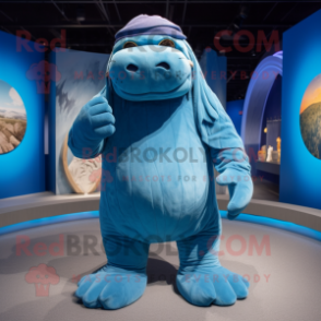 Blue Walrus mascot costume character dressed with a Romper and Beanies