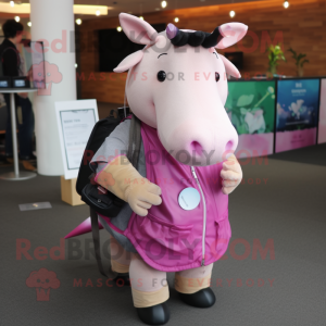 Pink Tapir mascot costume character dressed with a Waistcoat and Messenger bags
