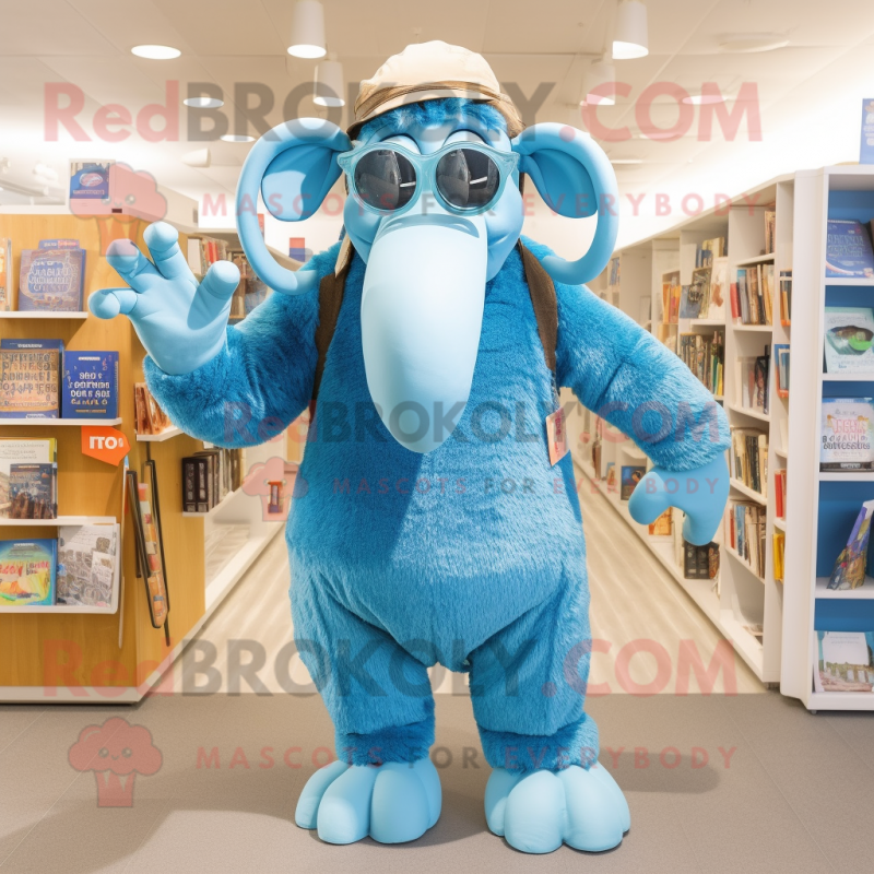 Sky Blue Mammoth mascot costume character dressed with a Dungarees and Reading glasses