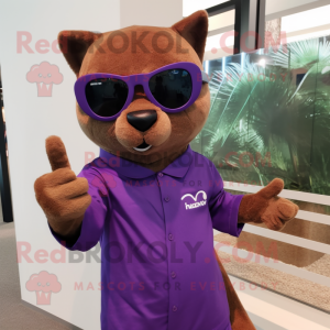 Purple Jaguarundi mascot costume character dressed with a Long Sleeve Tee and Sunglasses