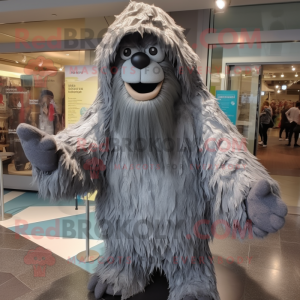 Gray Sasquatch mascot costume character dressed with a Raincoat and Headbands