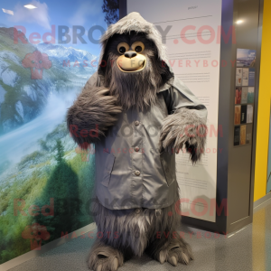 Gray Sasquatch mascot costume character dressed with a Raincoat and Headbands