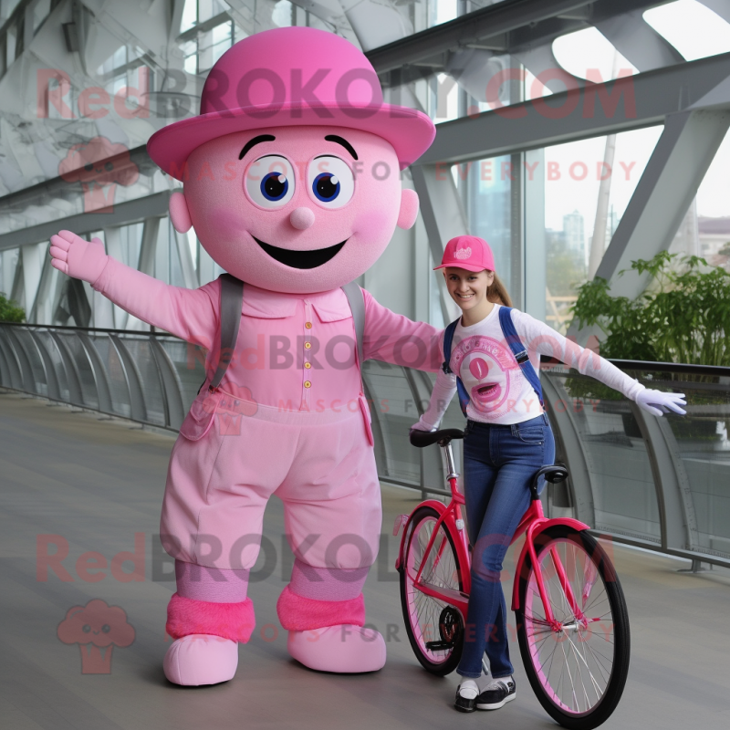 Pink Unicyclist mascot costume character dressed with a Mom Jeans and Hats