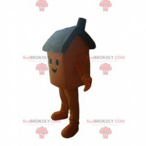 Mascotte de maisonnette marron souriante - Redbrokoly.com