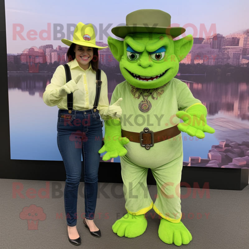 Lime Green Gargoyle mascot costume character dressed with a Mom Jeans and Berets Lime Green Gargoyle mascot costume character dressed with a Mom Jeans and Berets