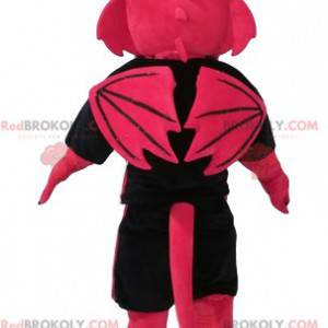 Mascotte de dragon fushia menaçant avec un maillot de supporter