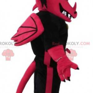 Fuchsia dragon mascot threatening with a supporter jersey -