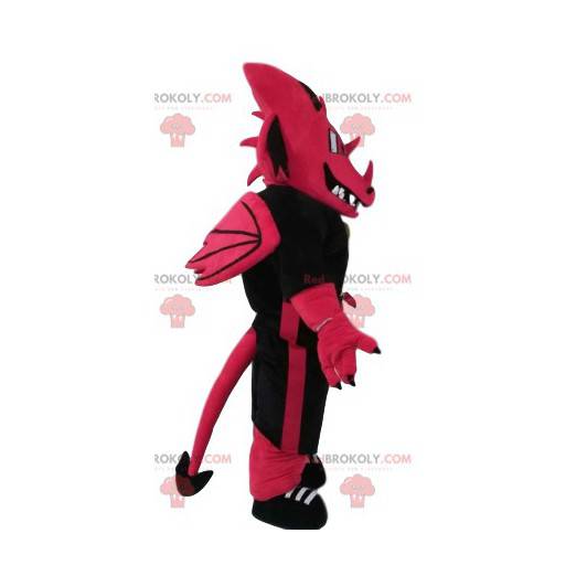 Fuchsia dragon mascot threatening with a supporter jersey -