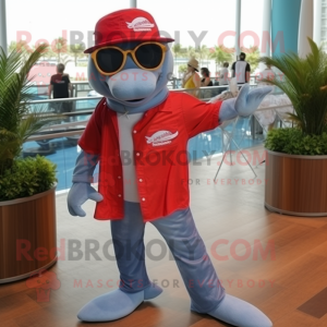 Red Dolphin mascot costume character dressed with a Chambray Shirt and Sunglasses