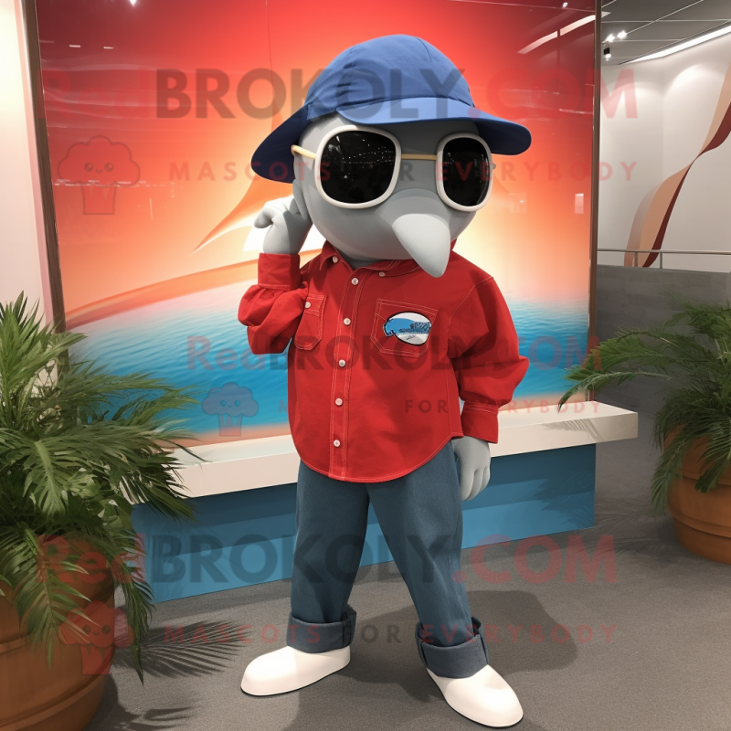 Red Dolphin mascot costume character dressed with a Chambray Shirt and Sunglasses