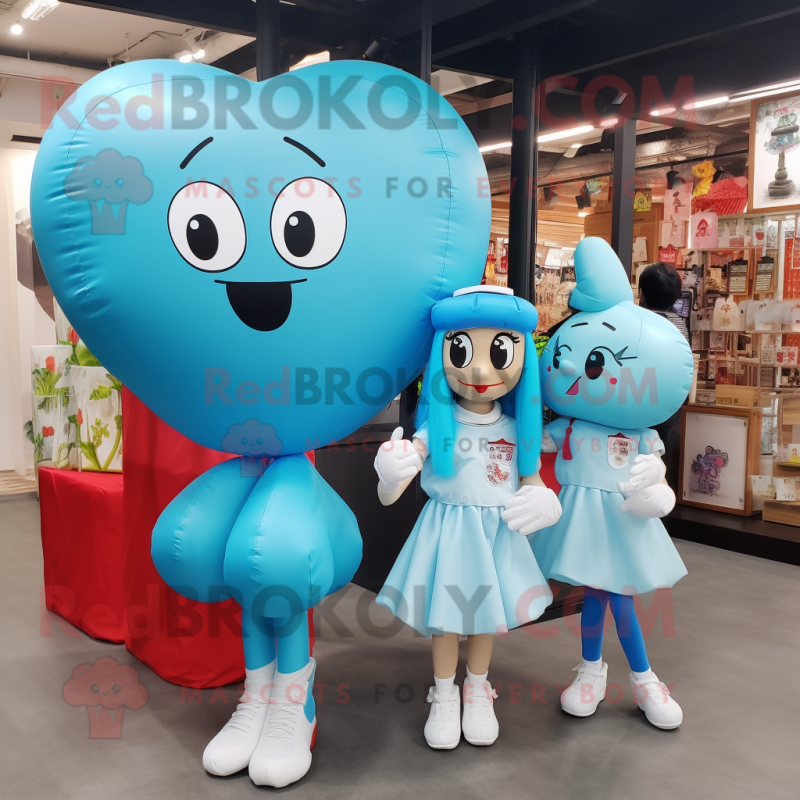 Cyan Heart Shaped Balloons mascot costume character dressed with a Mini Skirt and Messenger bags