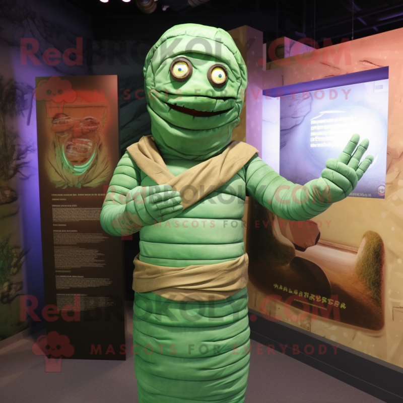 Green Mummy mascot costume character dressed with a Chinos and Wraps