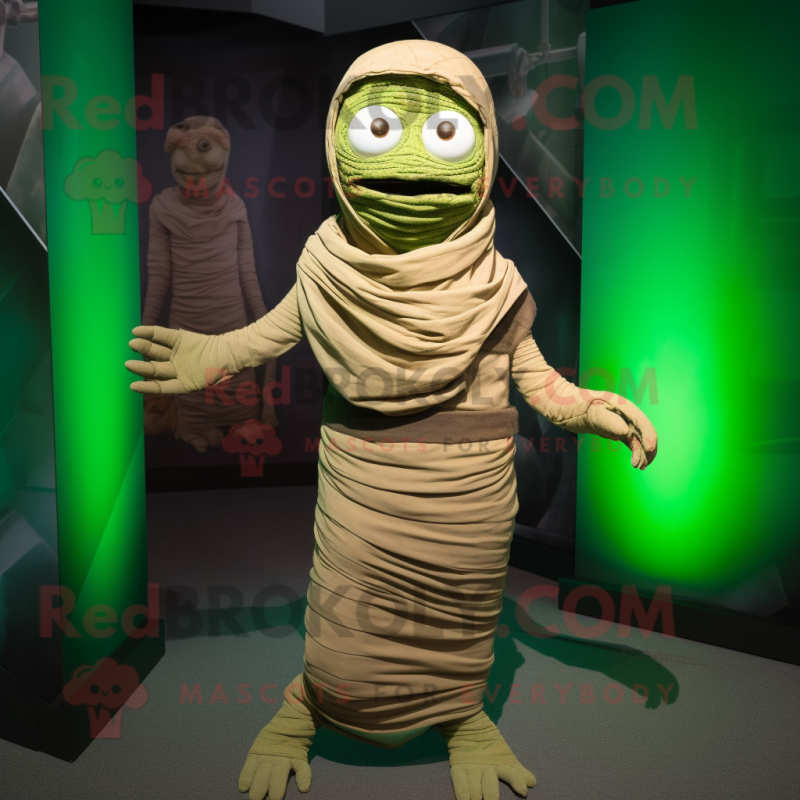 Green Mummy mascot costume character dressed with a Chinos and Wraps