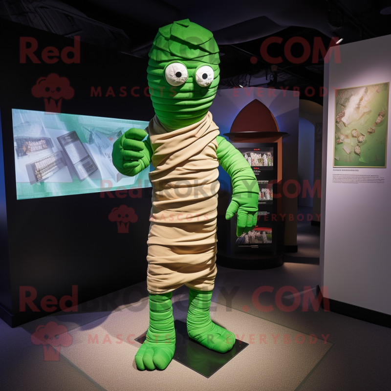 Green Mummy mascot costume character dressed with a Chinos and Wraps