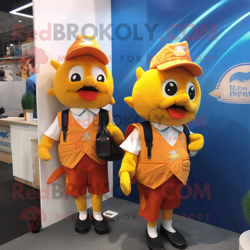 Gold Fish And Chips mascot costume character dressed with a Vest and Messenger bags Gold Fish And Chips mascot costume character dressed with a Vest and Messenger bags