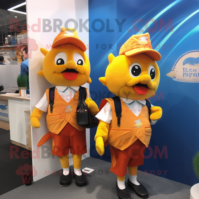 Gold Fish And Chips mascot costume character dressed with a Vest and Messenger bags