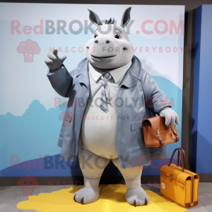 Gray Rhinoceros mascot costume character dressed with a Raincoat and Briefcases