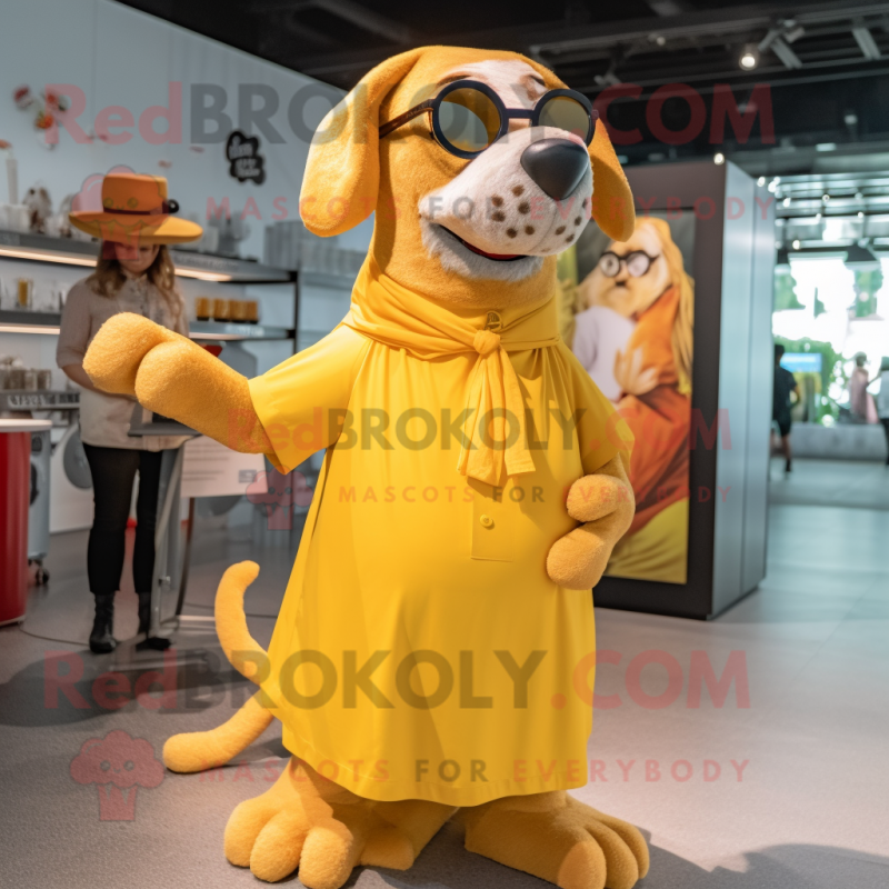 Gold Dog mascot costume character dressed with a Maxi Dress and Eyeglasses