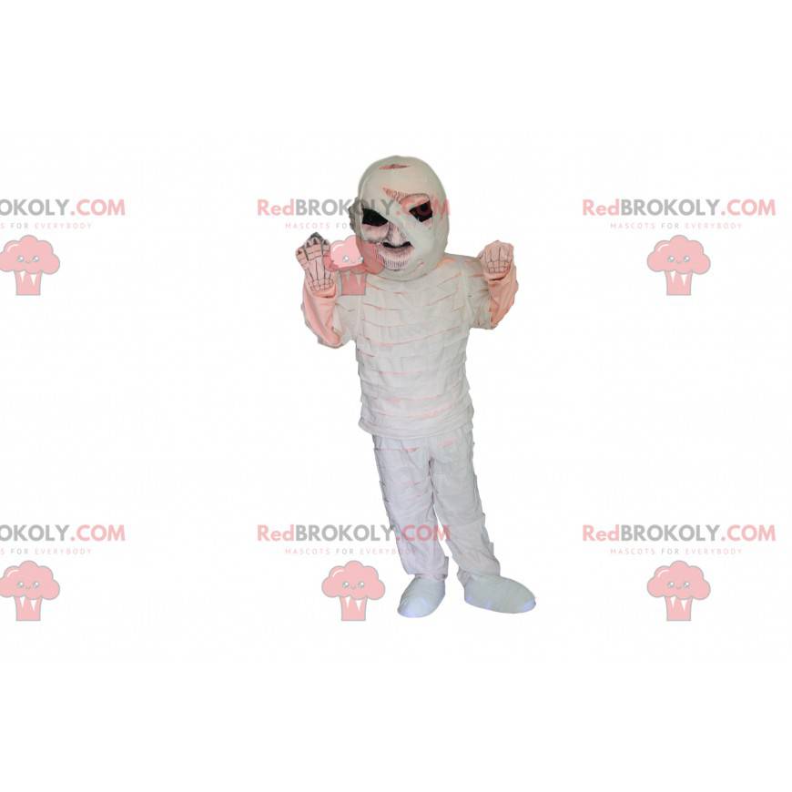 Mumifiziertes Skelettmaskottchen mit schwarzen Augen -