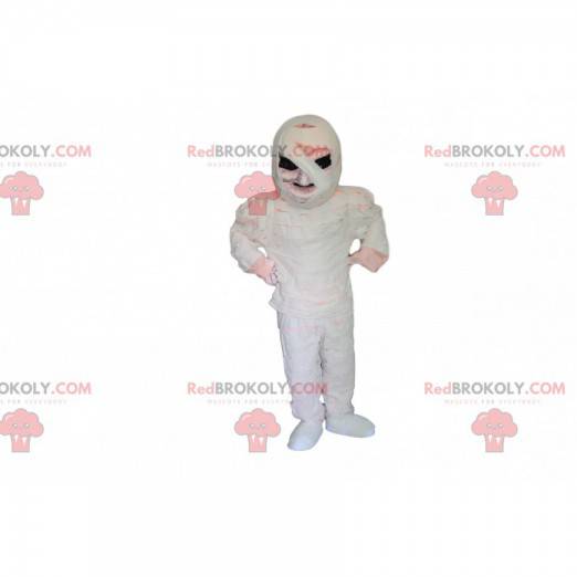 Mumifiziertes Skelettmaskottchen mit schwarzen Augen -