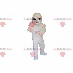 Mumifiziertes Skelettmaskottchen mit schwarzen Augen -