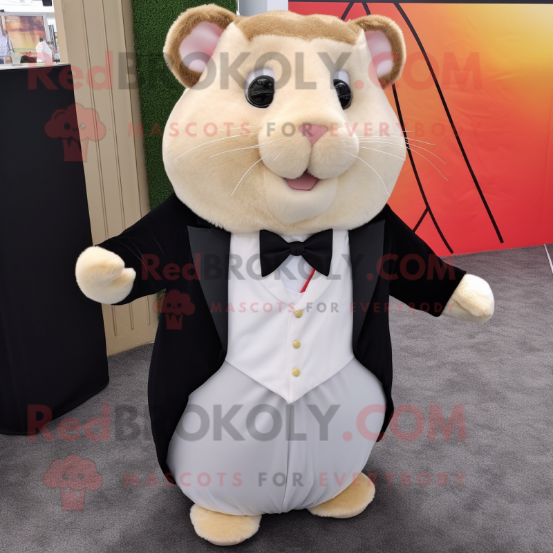 Tan Hamster mascot costume character dressed with a Tuxedo and Keychains