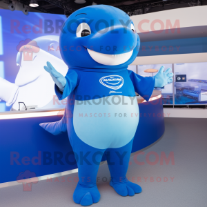 Blue Whale mascot costume character dressed with a Graphic Tee and Rings