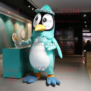 Turquoise Penguin mascot costume character dressed with a Blouse and Shoe clips