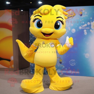 Yellow Mermaid mascot costume character dressed with a Sweatshirt and Foot pads