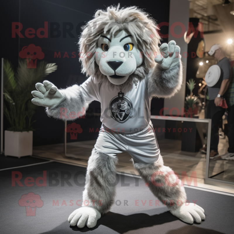 Silver Tamer Lion mascot costume character dressed with a Joggers and Ties Silver Tamer Lion mascot costume character dressed with a Joggers and Ties