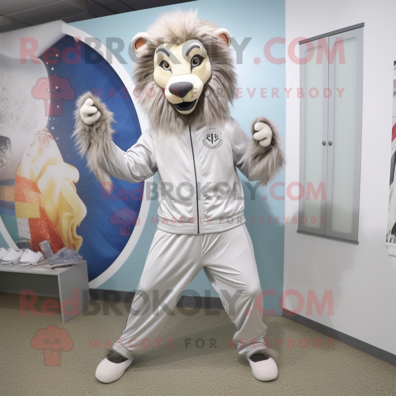 Silver Tamer Lion mascot costume character dressed with a Joggers and Ties Silver Tamer Lion mascot costume character dressed with a Joggers and Ties