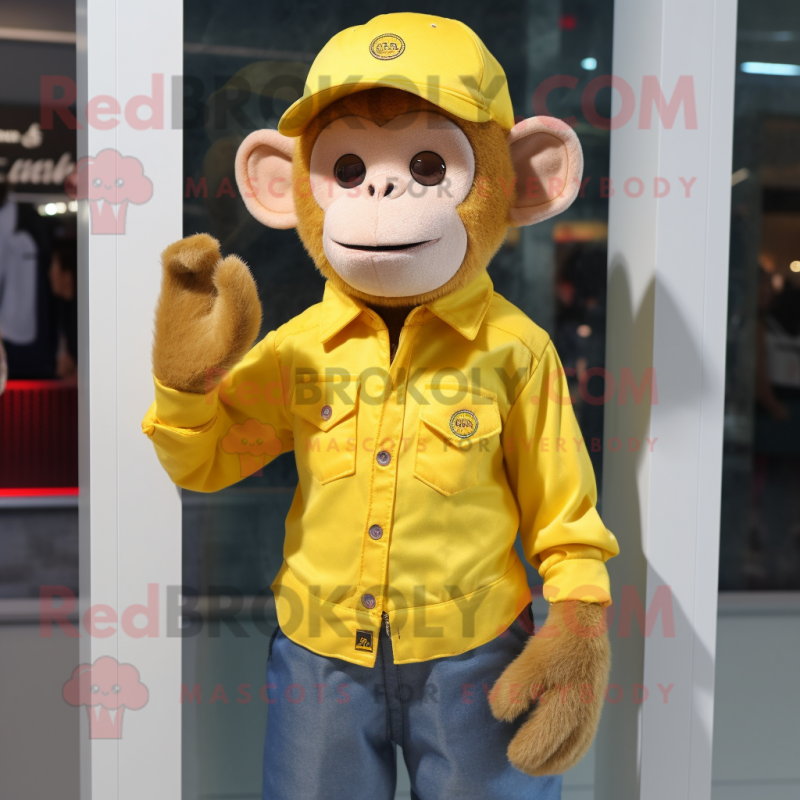 Yellow Monkey mascot costume character dressed with a Oxford Shirt and Beanies