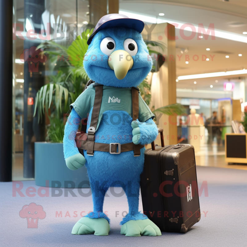 Cyan Kiwi mascot costume character dressed with a Dungarees and Briefcases