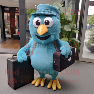 Cyan Kiwi mascot costume character dressed with a Dungarees and Briefcases
