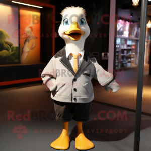 nan Geese mascot costume character dressed with a Jacket and Tie pins