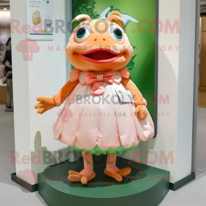 Peach Frog mascot costume character dressed with a A-Line Skirt and Keychains